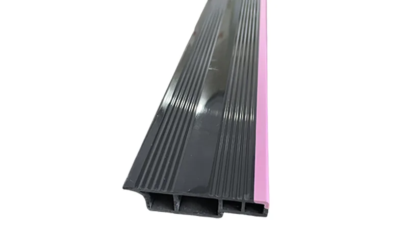 Dual-color co-extruded edge profile