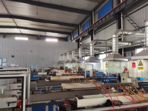 Plastic extrusion lines with operator control panels and exhaust hoods