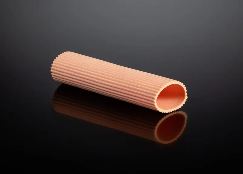 Peach corrugated plastic tube