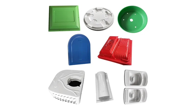 Group of thermoformed plastic parts in various colors and shapes