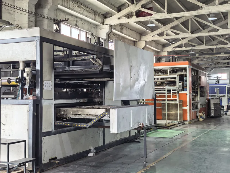 Row of vacuum forming machines