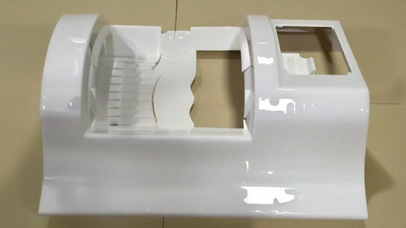 White machine shroud formed part